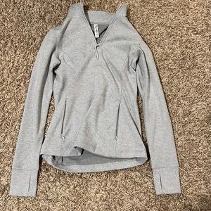 Gray quarter-zip jacket. Never worn.
